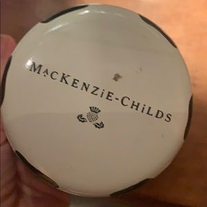 2- MacKenzie-Childs country check decor.